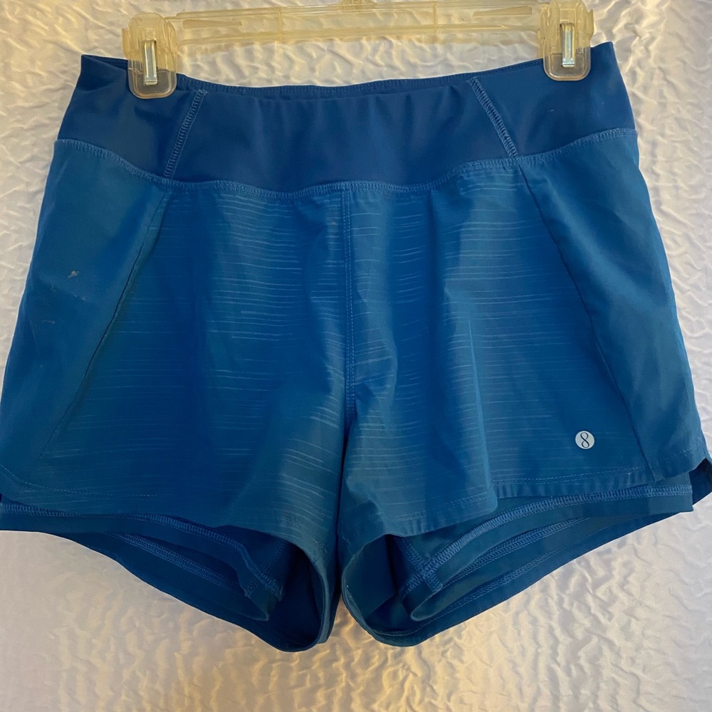 Athletic shorts with spandex liner